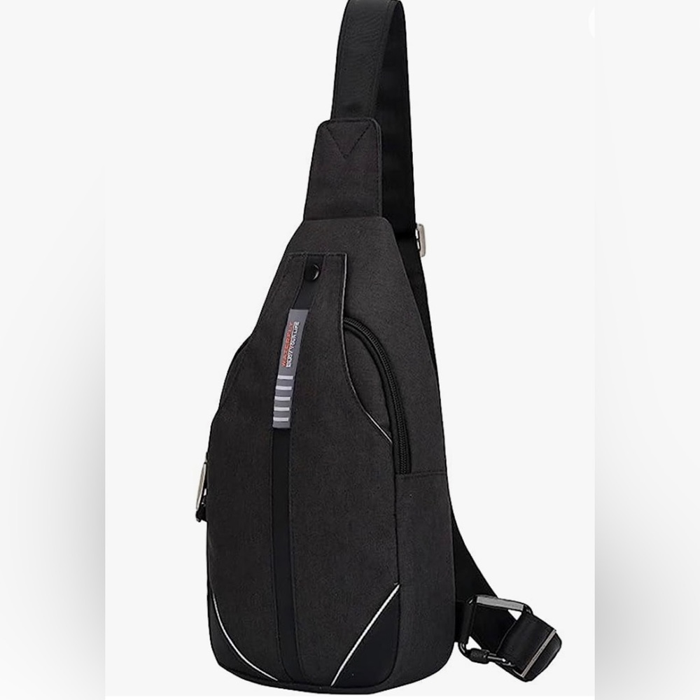 NWOT Waterfly sling crossbody anti-theft backpack. Unisex